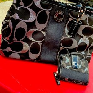Coach black and silver purse with small wallet in good condition.